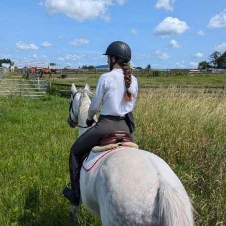 Woman riding a horse